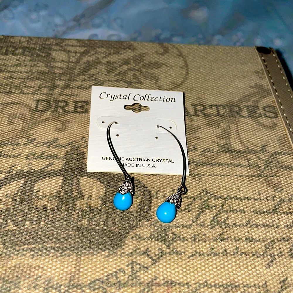 Blue threaded earrings